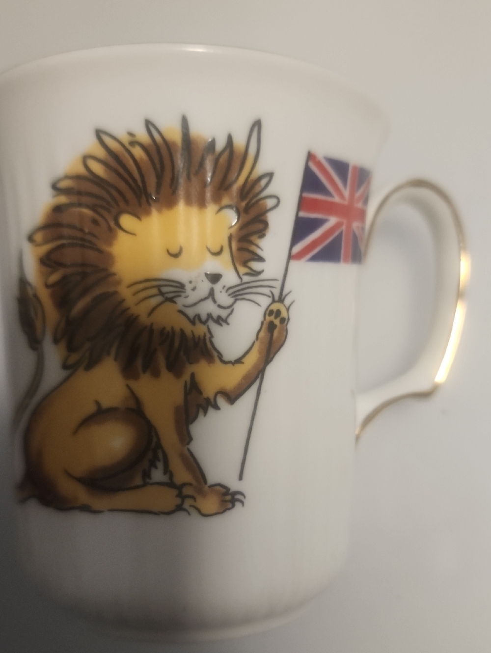 Royal Albert White and Gold Porcelain Mug with Lion Motif